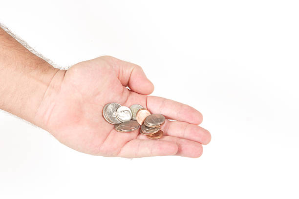 пригоршня изменений - penny coin human finger human thumb стоковые фото и изображения
