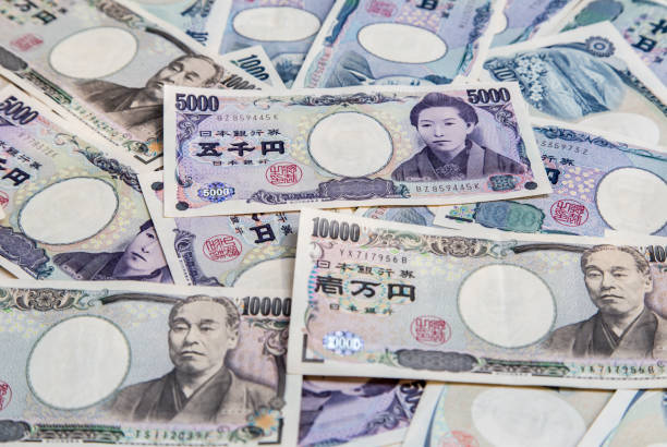 istock Japanese currency yen bank notes 908456062