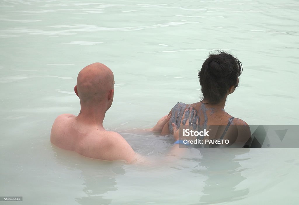 Casal na água e lama - Foto de stock de Adulto royalty-free