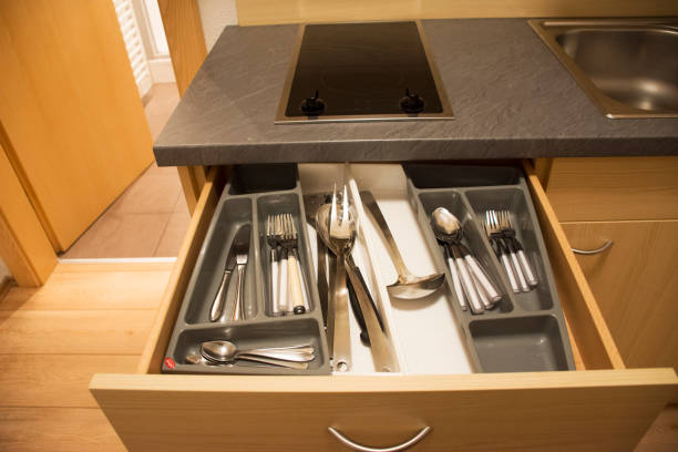 istock Kitchenware and dining accessories in drawer europe style in kitchen room 908459988