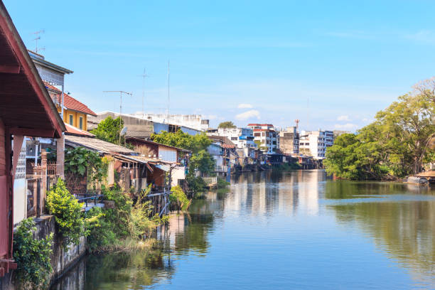 istock Lanscape of community riverside in Thailand 908462400