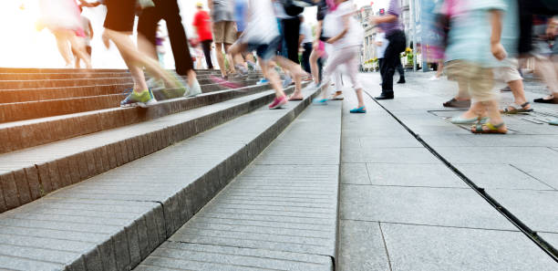 istock Human legs going up the stairs 908462520