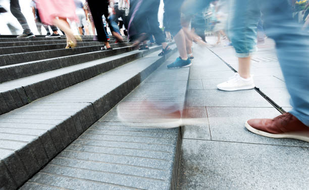 istock Human legs going up the stairs 908462534