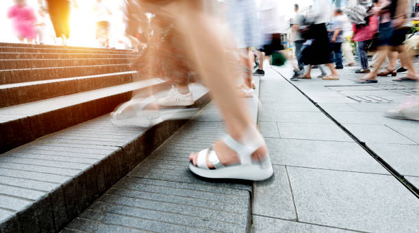 istock Human legs going up the stairs 908462536