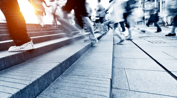 istock Human legs going up the stairs 908462574