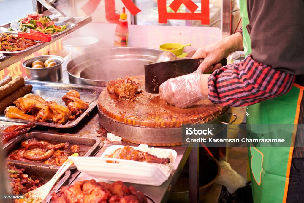 Chinese street food, stewed pork leg on rice Dalian Stock Photo