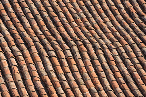 A detail of a terracotta clay roof.