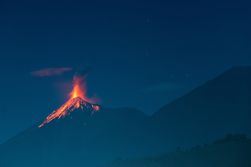 The Fuego volcano outside Antigua, Guatemala erupts in the early evening on February 02, 2014.