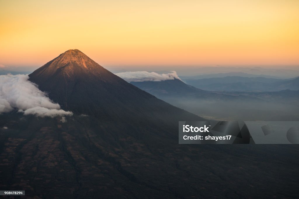 Agua volcano sunset Agua volcano outside Antigua, Guatemala taken at sunset from Acatenango volcano. Guatemala Stock Photo