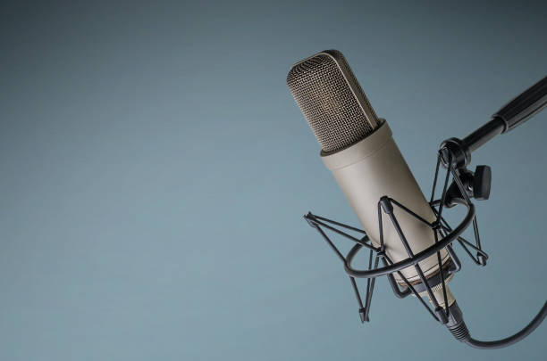 professional microphone background with a professional microphone podcast stock pictures, royalty-free photos & images