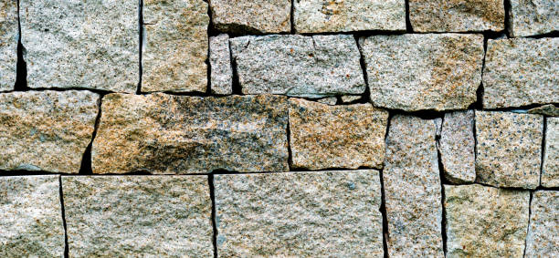 istock Close up of stone wall 908487670