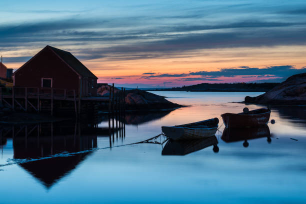 istock Evening fishing shacks 908487878
