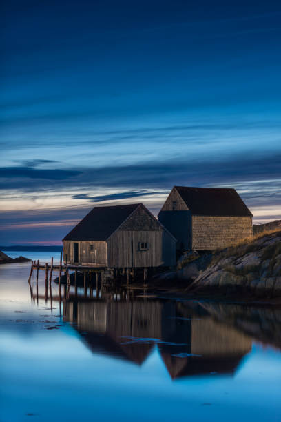 istock Night fishing shacks 908490132