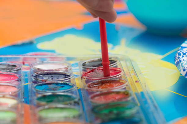 istock Paint brush and colors 908501696