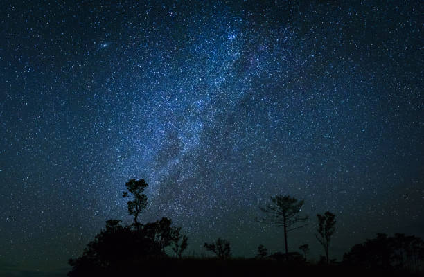 istock beautiful sky at night with Milky Way 908508410