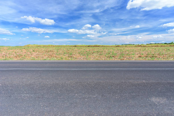 istock Asphalt road and countryside views 908511238