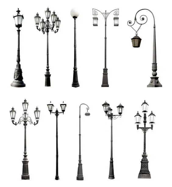 Set of decorative lampposts over white background