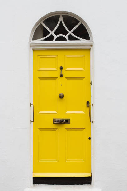 istock yellow elegant residential apartment door 908521480
