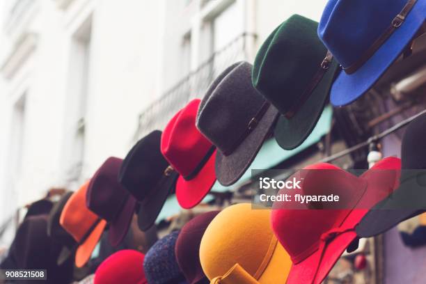 Stand With Colorful Hats On Store Entrance Stock Photo - Download Image Now - Hat, Multi Colored, Shopping