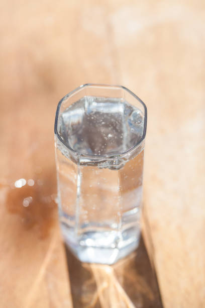 istock glass water wood natural background, 908528308