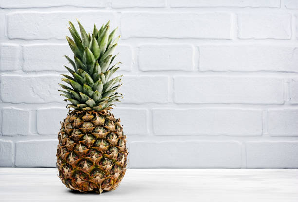 istock Fresh ripe whole pineapple for healthy nutrition 908534910