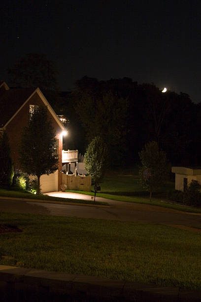istock House at Night + Lights and Moon 90854008