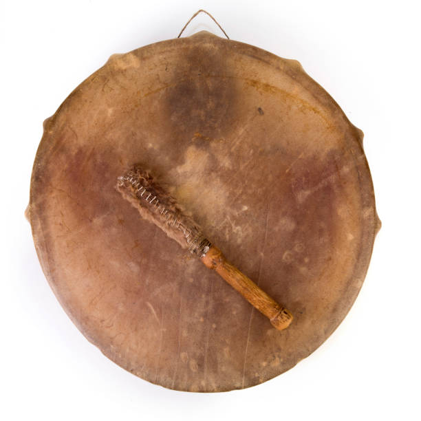 Ancient indian tambourine drum drumstick replica stock photo