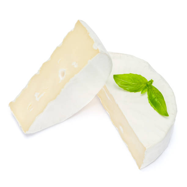 istock Piece of brie or camambert cheese on a white background 908546210