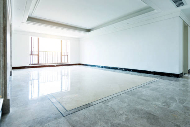 istock Empty living room in modern apartment 908546550
