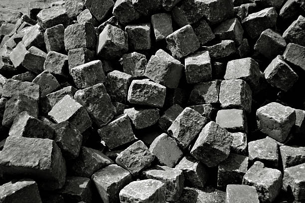 pile of bricks in black and white stock photo