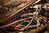 Many cables on the music recording mixer