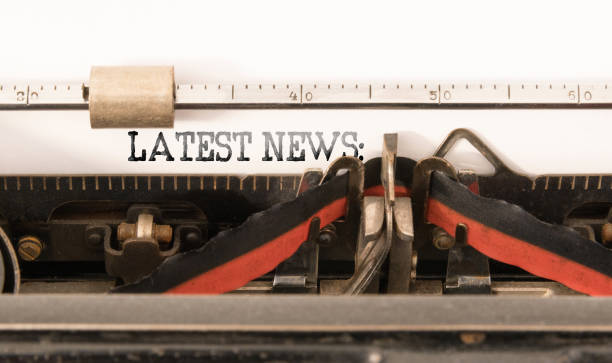 istock words LATEST NEWS written on vintage manual typewriter 908570442