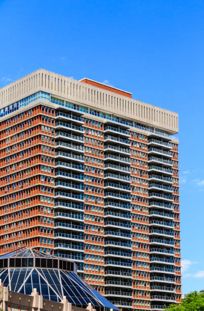 istock Many Balconies on Red Brick Apartment Building 908572182