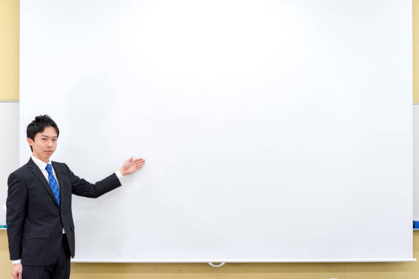 istock The image of a businessman presenting 908576016