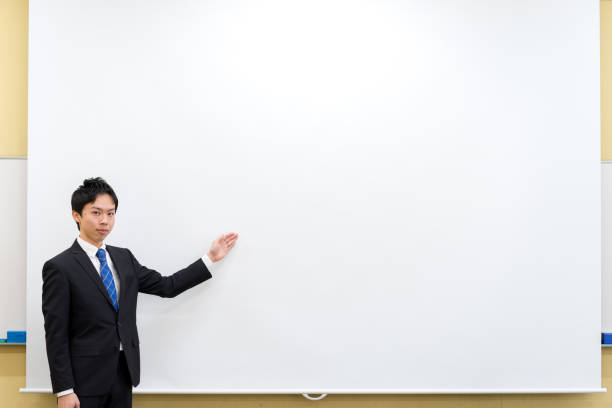 istock The image of a businessman presenting 908576062