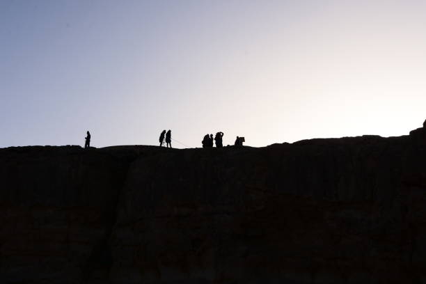 istock A group of hikers on a cliff 908578548