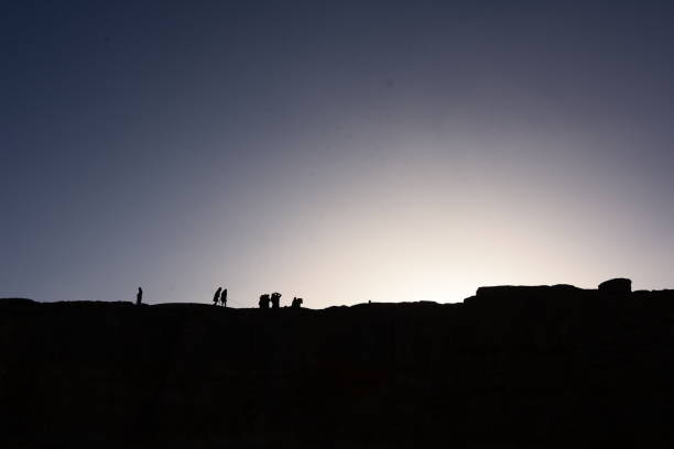 istock A group of hikers on a cliff 908578872