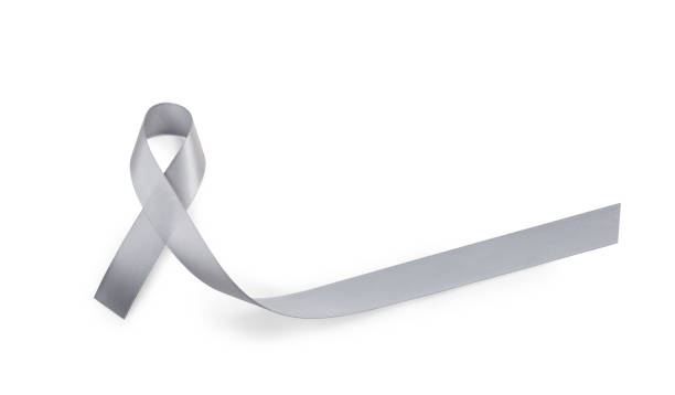 istock Parkinsons disease awareness or brain cancer grey or silver ribbon isolate on white background (Clipping path included) with copy space for text, logo, wordings decoration or insertion, health concept 908581556