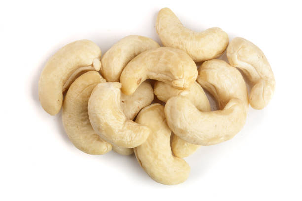 istock cashew nuts isolated on white background. top view. Flat lay 908600322