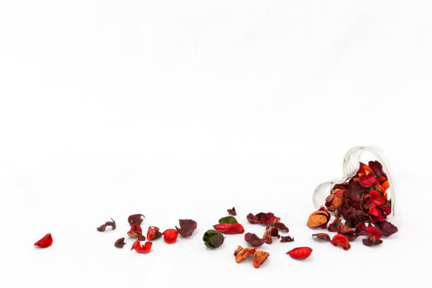 istock Dry flower in heart shape glass isolate on white background, Valentine concept 908603096