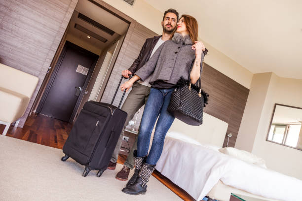 istock Happy young couple at home 908604492