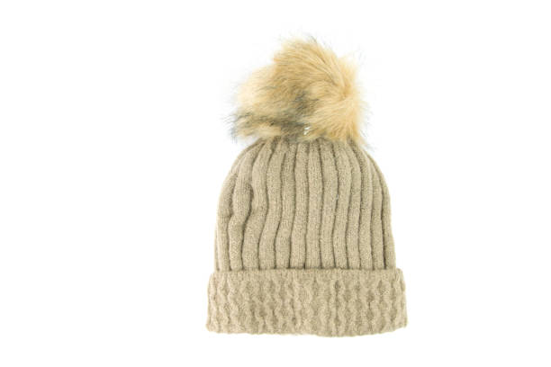 istock Brown wool knitted hat isolated on white background. 908605290