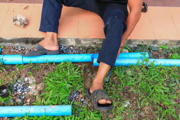 istock plumber cut  with saw repair, plumbing broken pipe 908605976