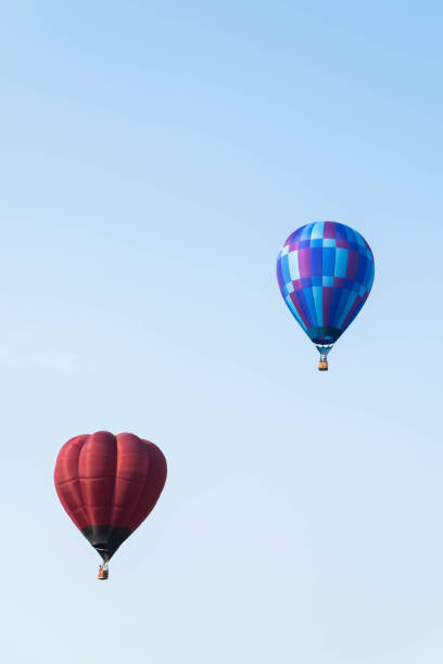 istock Hot air balloon flying in the sky 908610790