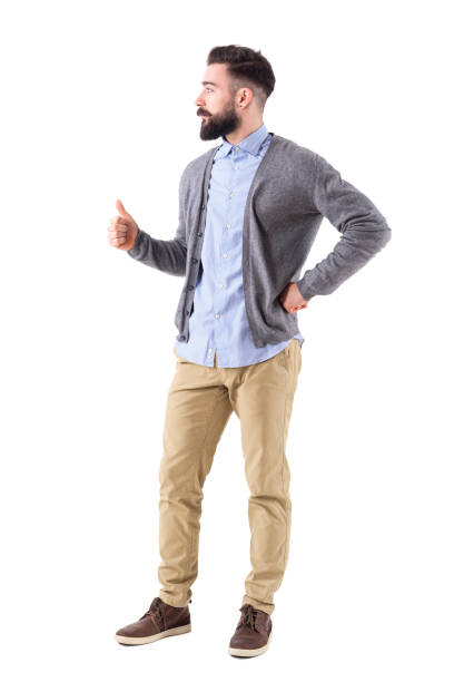 Rear view of businessman arms outstretched.