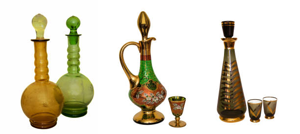 istock set antiquities glass bottles for alcoholic drinks isolated on a white background. 908611376