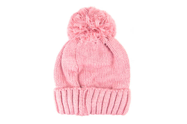 istock Pink wool knitted hat isolated on white background. 908613742