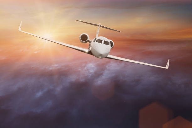 istock Commercial airplane flying above clouds 908618532
