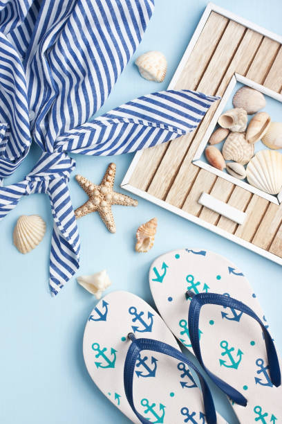 istock Summer accessories on wooden background 908618750