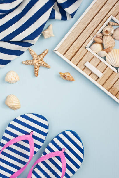 istock Summer accessories on wooden background 908618798
